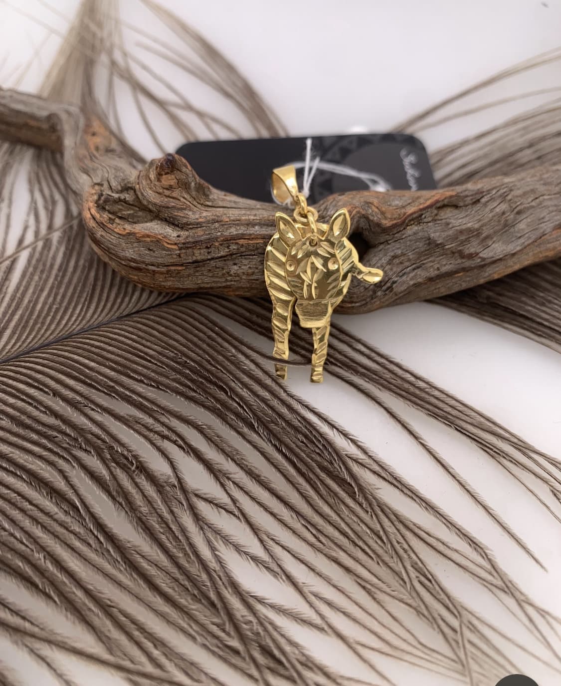 S.S Gold plated mobile hand cut Zebra pendant